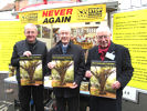 LtoR: Ray Woodcock, Sir Alan Haselhurst and Peter Sanders with the 2014 Community Calendar at the SSE Trailer in Saffron Walden on 7 December 2013